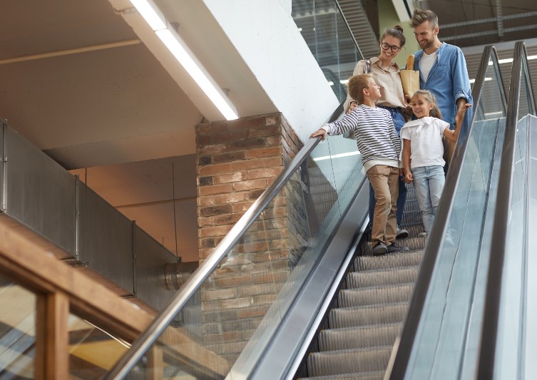San Francisco Elevator and Escalator Accident Lawyers Picture of a Family Riding an Escalator