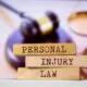 photo of the words personal injury law with a judge's gavel in the background