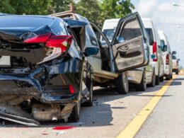 photo of a honda that has been hit from behind in a rear end collision