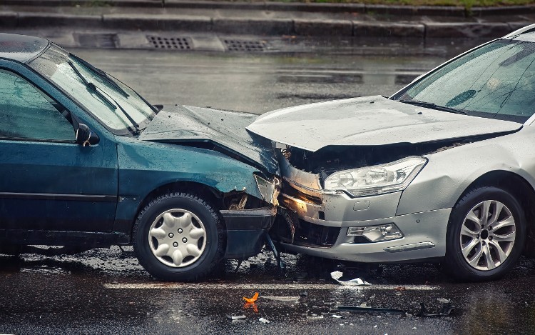 photo of a head on collision car accident